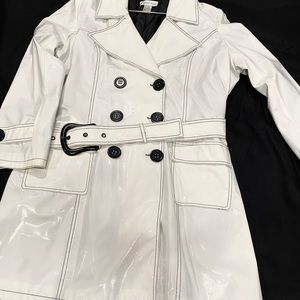 Women’s  white rain coat with a black lining